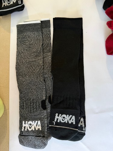 Hoka crew socks with defect - with,